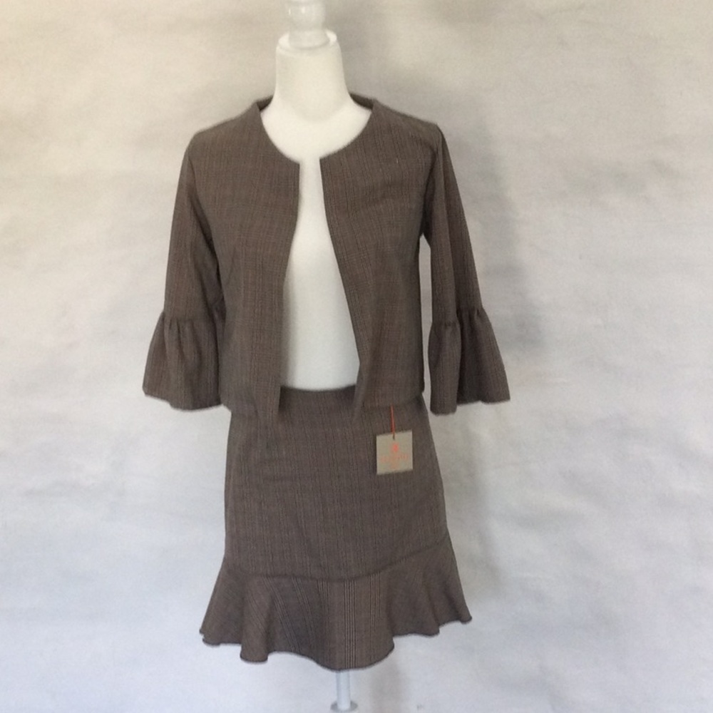 Houndstooth bolero jacket and skirt.